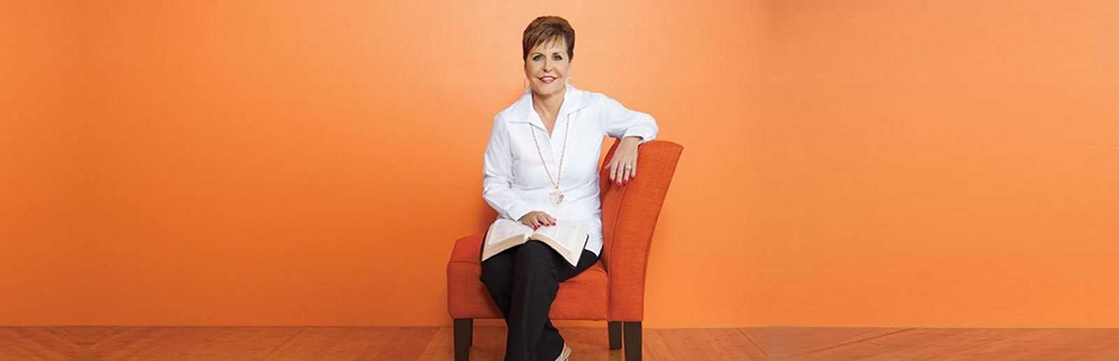 Joyce Meyer seated on a chair